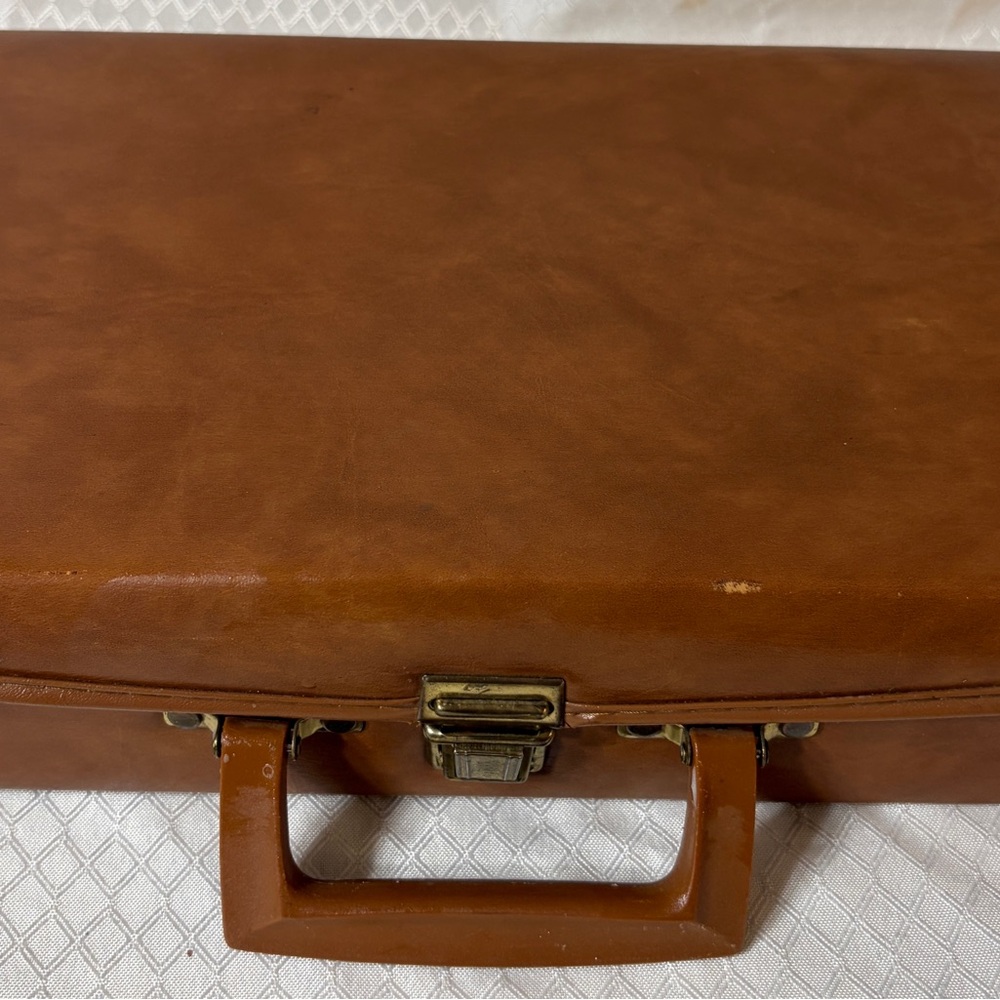 24 vintage cassettes in case